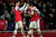 LONDON, ENGLAND - JANUARY 01: Theo Walcott of Arsenal (14) celebrates with Mikel Arteta (L) as he scores their second goal during the Barclays Premier League match between Arsenal and Cardiff City at Emirates Stadium on January 1, 2014 in London, England. (Photo by Shaun Botterill/Getty Images)