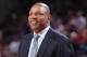 PORTLAND, OR - DECEMBER 26: Doc Rivers of the Los Angeles Clippers smiles against the Portland Trail Blazers on December 26, 2013 at the Moda Center Arena in Portland, Oregon. NOTE TO USER: User expressly acknowledges and agrees that, by downloading and or using this photograph, user is consenting to the terms and conditions of the Getty Images License Agreement. Mandatory Copyright Notice: Copyright 2013 NBAE (Photo by Sam Forencich/NBAE via Getty Images)