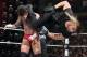 Seth Rollins nails CM Punk with an enzuigiri.