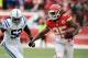 Dec 22, 2013; Kansas City, MO, USA; Kansas City Chiefs running back Jamaal Charles (25) runs the ball as Indianapolis Colts inside linebacker Kelvin Sheppard (52) attempts the tackle during the first half at Arrowhead Stadium. Mandatory Credit: Denny Medley-USA TODAY Sports