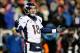 FOXBORO, MA - NOVEMBER 24: Quarterback Peyton Manning #18 of the Denver Broncos looks on against the New England Patriots during a game at Gillette Stadium on November 24, 2013 in Foxboro, Massachusetts. (Photo by Jim Rogash/Getty Images)