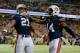 ATLANTA, GA - DECEMBER 07: Tre Mason #21 of the Auburn Tigers celebrates his fourth quarter touchdown with teammate quarterback Nick Marshall #14 against the Missouri Tigers during the SEC Championship Game at Georgia Dome on December 7, 2013 in Atlanta, Georgia. (Photo by Kevin C. Cox/Getty Images)
