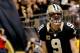 Dec 29, 2013; New Orleans, LA, USA; New Orleans Saints quarterback Drew Brees (9) celebrates a touchdown run against the Tampa Bay Buccaneers during the fourth quarter of a game at the Mercedes-Benz Superdome.The Saints defeated the Buccaneers 42-17. Mandatory Credit: Derick E. Hingle-USA TODAY Sports