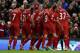 LIVERPOOL, ENGLAND - JANUARY 01: Liverpool's Jordan Henderson and team mates celebrate after Daniel Agger has scored the first goal during the Barclays Premier League match between Liverpool and Hull City at Anfield on January 1, 2014 in Liverpool, England. (Photo by Clive Brunskill/Getty Images)