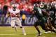 Dec 7, 2013; Indianapolis, IN, USA; Ohio State Buckeyes running back Carlos Hyde (34) runs the ball during the third quarter of the 2013 Big 10 Championship game against the Michigan State Spartans at Lucas Oil Stadium. Mandatory Credit: Andrew Weber-USA TODAY Sports