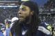 Dec 29, 2013; Seattle, WA, USA; Seattle Seahawks cornerback Richard Sherman (25) walks off the field following a 29-7 victory against the St. Louis Rams at CenturyLink Field. Mandatory Credit: Joe Nicholson-USA TODAY Sports