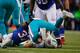 ORCHARD PARK, NY - DECEMBER 22: Ryan Tannehill #17 of the Miami Dolphins is sacked by Nickell Robey #37 of the Buffalo Bills at Ralph Wilson Stadium on December 22, 2013 in Orchard Park, New York. Buffalo won 16-0. (Photo by Rick Stewart/Getty Images)