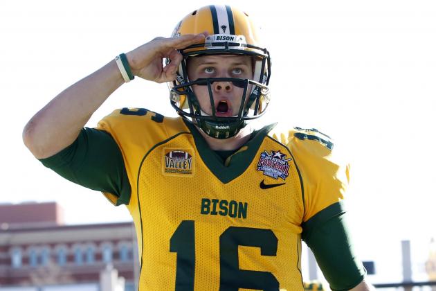 Jan 4, 2014; Frisco, TX, USA; North Dakota State Bison quarterback Brock Jensen (16) gestures to the crowd after scoring a touchdown in the third quarter of the game against the Towson Tigers at Toyota Stadium. Mandatory Credit: Tim Heitman-USA TODAY Sports