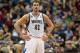 Jan 4, 2014; Minneapolis, MN, USA; Minnesota Timberwolves power forward Kevin Love (42) looks on during a free throw in the first half against the Oklahoma City Thunder at Target Center. Mandatory Credit: Jesse Johnson-USA TODAY Sports