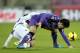 FLORENCE, ITALY - JANUARY 06: Giuseppe Rossi of ACF Fiorentina fights for the ball with Andrea Luci of AS Livorno Calcio during the Serie A match between ACF Fiorentina and AS Livorno Calcio at Stadio Artemio Franchi on January 5, 2014 in Florence, Italy. (Photo by Gabriele Maltinti/Getty Images)