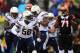 Jan 5, 2014; Cincinnati, OH, USA; San Diego Chargers inside linebacker Donald Butler (56) celebrates after a sack during fourth quarter of the AFC wild card playoff football game against the Cincinnati Bengals at Paul Brown Stadium. Mandatory Credit: Andrew Weber-USA TODAY Sports