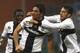 GENOA, ITALY - DECEMBER 22: Alessandro Lucarelli (C) of Parma FC celebrates with his team-mates Nicola Sansone (R) and Afriyie Acquah (L) after scoring during the Serie A match between UC Sampdoria and Parma FC at Stadio Luigi Ferraris on December 22, 2013 in Genoa, Italy. (Photo by Marco Luzzani/Getty Images)