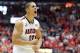 Jan 4, 2014; Tucson, AZ, USA; Arizona Wildcats guard Nick Johnson (13) celebrates during the first half against the Washington Huskies at McKale Center. Mandatory Credit: Casey Sapio-USA TODAY Sports