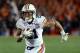 Jan 6, 2014; Pasadena, CA, USA; Auburn Tigers running back Tre Mason (21) scores a touchdown against the Florida State Seminoles during the second half of the 2014 BCS National Championship game at the Rose Bowl. Mandatory Credit: Jayne Kamin-Oncea-USA TODAY Sports