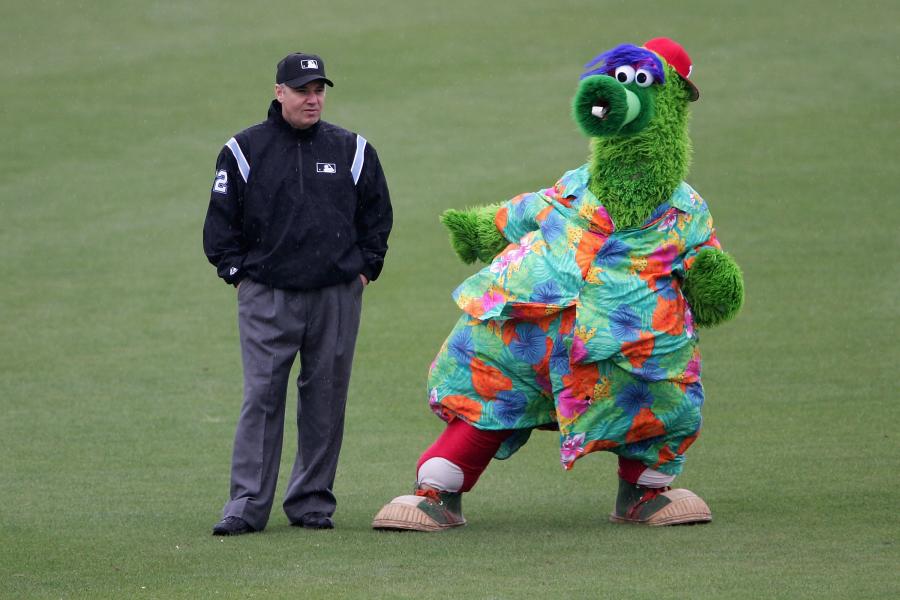 Cincinnati Reds mascot Mr Redlegs runs with a flag after the game News  Photo - Getty Images