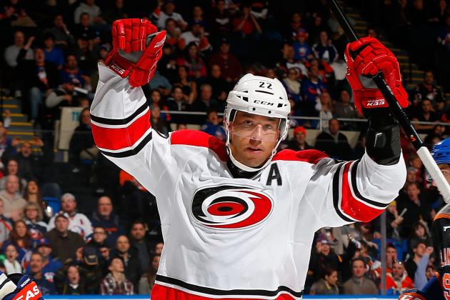 UNIONDALE, NY - JANUARY 04: Manny Malhotra #22 of the Carolina Hurricanes celebrates his second period goal during the game against the New York Islanders at Nassau Veterans Memorial Coliseum on January 4, 2014 in Uniondale, New York. (Photo by Mike Stobe/NHLI via Getty Images)