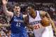 Jan 6, 2014; Philadelphia, PA, USA; Philadelphia 76ers forward Thaddeus Young (21) is defended by Minnesota Timberwolves forward Kevin Love (42) during the first quarter at the Wells Fargo Center. Mandatory Credit: Howard Smith-USA TODAY Sports