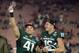 Jan 1, 2014; Pasadena, CA, USA; Michigan State Spartans linebacker Kyler Elsworth (41) and quarterback Connor Cook (18) celebrate after the 100th Rose Bowl against the Stanford Cardinal. Michigan State defeated Stanford 24-20. Mandatory Credit: Kirby Lee-USA TODAY Sports