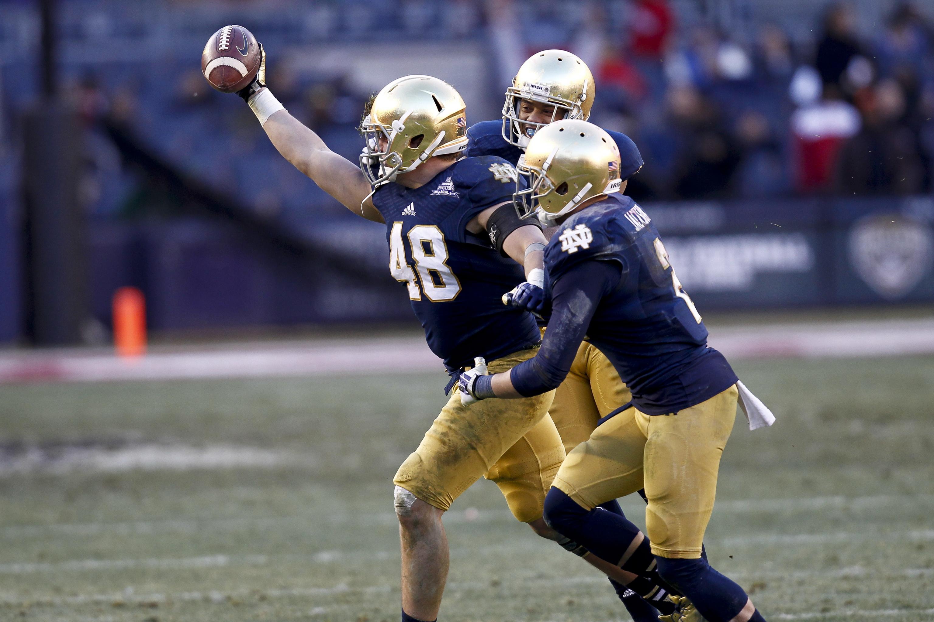 New Notre Dame and Auburn uniforms do impossible things, Under Armour  claims 