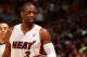 MIAMI, FL - JANUARY 7: Dwyane Wade #3 of the Miami Heat looks on against the New Orleans Pelicans at the American Airlines Arena in Miami, Florida on Jan. 7, 2014. NOTE TO USER: User expressly acknowledges and agrees that, by downloading and/or using this photograph, user is consenting to the terms and conditions of the Getty Images License Agreement. Mandatory copyright notice: Copyright NBAE 2014 (Photo by Issac Baldizon/NBAE via Getty Images)
