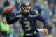 SEATTLE, WA - DECEMBER 29: Quarterback Russell Wilson #3 of the Seattle Seahawks passes against the St. Louis Rams at CenturyLink Field on December 29, 2013 in Seattle, Washington. (Photo by Otto Greule Jr/Getty Images)