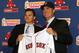 General manager Ben Cherington (left) and manager John Farrell (right) appear content with the current Red Sox roster in 2014.
