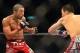 Aug 3, 2013; Rio De Janeiro, Brazil; Jose Aldo (red gloves) fights Chan Sung Jung (blue gloves) during UFC 163 at HSBC Arena. Mandatory Credit: Jason Silva-USA TODAY Sports