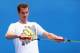 MELBOURNE, AUSTRALIA - JANUARY 12: Andy Murray of Great Britain stretches during practice ahead of the 2014 Australian Open at Melbourne Park on January 12, 2014 in Melbourne, Australia. (Photo by Quinn Rooney/Getty Images)