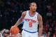 Dec 16, 2013; New York, NY, USA; New York Knicks shooting guard J.R. Smith (8) brings the ball up court during the second half against the Washington Wizards at Madison Square Garden. Washington Wizards defeat the New York Knicks 102-101. Mandatory Credit: Jim O'Connor-USA TODAY Sports