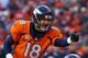 DENVER, CO - JANUARY 12: Peyton Manning #18 of the Denver Broncos calls a play during the AFC Divisional Playoff Game against the San Diego Chargers at Sports Authority Field at Mile High on January 12, 2014 in Denver, Colorado. (Photo by Doug Pensinger/Getty Images)