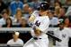 Sep 4, 2013; Bronx, NY, USA; New York Yankees center fielder Brett Gardner (11) triples to deep left allowing two runners to score during the fourth inning against the Chicago White Sox at Yankee Stadium. Mandatory Credit: Anthony Gruppuso-USA TODAY Sports