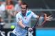 MELBOURNE, AUSTRALIA - JANUARY 14: Andy Murray of Great Britain plays a backhand in his first round match against Go Soeda of Japan during day two of the 2014 Australian Open at Melbourne Park on January 14, 2014 in Melbourne, Australia. (Photo by Clive Brunskill/Getty Images)