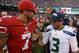 December 8, 2013; San Francisco, CA, USA; San Francisco 49ers quarterback Colin Kaepernick (7) shakes hands with Seattle Seahawks quarterback Russell Wilson (3) after the game at Candlestick Park. The 49ers defeated the Seahawks 19-17. Mandatory Credit: Kyle Terada-USA TODAY Sports