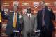 AUSTIN, TX - JANUARY 6: University of Texas president Bill Powers, left and athletic director Steve Patterson, right, introduce new Longhorns head football coach Charlie Strong from Louisville during a press conference January 6, 2014 at Darrell K. Royal-Texas Memorial Stadium in Austin, Texas. (Photo by Erich Schlegel/Getty Images)