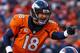 DENVER, CO - JANUARY 12: Peyton Manning #18 of the Denver Broncos calls a play during the AFC Divisional Playoff Game against the San Diego Chargers at Sports Authority Field at Mile High on January 12, 2014 in Denver, Colorado. (Photo by Doug Pensinger/Getty Images)