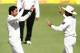 CAPE TOWN, SOUTH AFRICA - FEBRUARY 17: Saeed Ajmal of Pakistan is congratulated by Younis Khan of Pakistan after getting thw wicket of Jacques Kallis of South Africa during day 4 of the 2nd Sunfoil Test match between South Africa and Pakistan at Sahara Park Newlands on February 17, 2013 in Cape Town, South Africa. (Photo by Shaun Roy/Gallo Images/Getty Images)