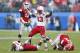 JACKSONVILLE, FL - JANUARY 1: Zaire Anderson #13 of the Nebraska Cornhuskers celebrates after tackling Brendan Douglas #22 of the Georgia Bulldogs in the first half during the TaxSlayer.com Gator Bowl at Everbank Field on January 1, 2014 in Jacksonville, Florida. (Photo by Joe Robbins/Getty Images)