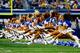 ARLINGTON, TX - DECEMBER 15: Dallas Cowboys cheerleaders perform prior to a game against the Green Bay Packers at AT&T Stadium on December 15, 2013 in Arlington, Texas. (Photo by Tom Pennington/Getty Images)