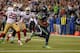 SEATTLE, WA - SEPTEMBER 15: Running back Marshawn Lynch #24 of the Seattle Seahawks rushes for a touchdown in the third quarter against the San Francisco 49ers at CenturyLink Field on September 15, 2013 in Seattle, Washington. (Photo by Otto Greule Jr/Getty Images)