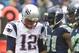 SEATTLE, WA - OCTOBER 14: Tom Brady #12 of the New England Patriots talks with Chris Clemons #91 of the Seattle Seahawks between plays during a game at CenturyLink Field on October 14, 2012 in Seattle, Washington. The Seahawks beat the Patriots 24-23. (Photo by Stephen Brashear/Getty Images)