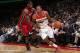 WASHINGTON, DC - JANUARY 15: Trevor Ariza #1 of the Washington Wizards drives against LeBron James #6 of the Miami Heat during the game at the Verizon Center on January 15, 2014 in Washington, DC. NOTE TO USER: User expressly acknowledges and agrees that, by downloading and or using this photograph, User is consenting to the terms and conditions of the Getty Images License Agreement. Mandatory Copyright Notice: Copyright 2014 NBAE (Photo by Ned Dishman/NBAE via Getty Images)