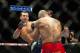 Jan 15, 2014; Duluth, GA, USA; Luke Rockhold (red gloves) fights Costas Philippou (blue gloves) during UFC Fight Night at Gwinnett Center. Rockhold wins. Mandatory Credit: Joshua S. Kelly-USA TODAY Sports