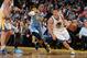 OAKLAND, CA - JANUARY 15: Klay Thompson #11 of the Golden State Warriors handling the ball during a game agsint the Denver Nuggets on January 15, 2014 at the Oracle Aren in Oakland, California. NOTE TO USER: User expressly acknowledges and agrees that, by downloading and/or using this Photograph, user is consenting to the terms and conditions of the Getty Images License Agreement. Mandatory Copyright Notice: Copyright 2014 NBAE (Photo by Garrett W. Ellwood/NBAE via Getty Images)