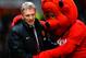MANCHESTER, ENGLAND - JANUARY 11: Manchester United Manager David Moyes is greeted by mascot Fred the Red prior to the Barclays Premier League match between Manchester United and Swansea City at Old Trafford on January 11, 2014 in Manchester, England. (Photo by Shaun Botterill/Getty Images)