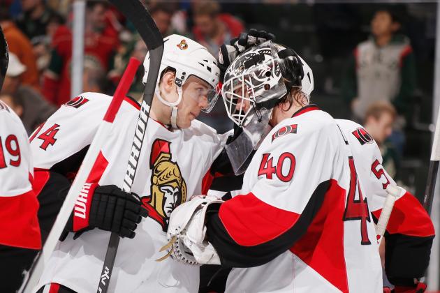 ST. PAUL, MN - JANUARY 14: (R-L) Goalie Robin Lehner #40 is congratulated by his Ottawa Senators teammate Colin Greening #14 after shutting out the Minnesota Wild after on January 14, 2014 at the Xcel Energy Center in St. Paul, Minnesota. (Photo by Bruce Kluckhohn/NHLI via Getty Images)