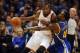 Nov 29, 2013; Oklahoma City, OK, USA; Oklahoma City Thunder small forward Kevin Durant (35) handles the ball against Golden State Warriors small forward Harrison Barnes (40) during the second quarter at Chesapeake Energy Arena. Mandatory Credit: Mark D. Smith-USA TODAY Sports