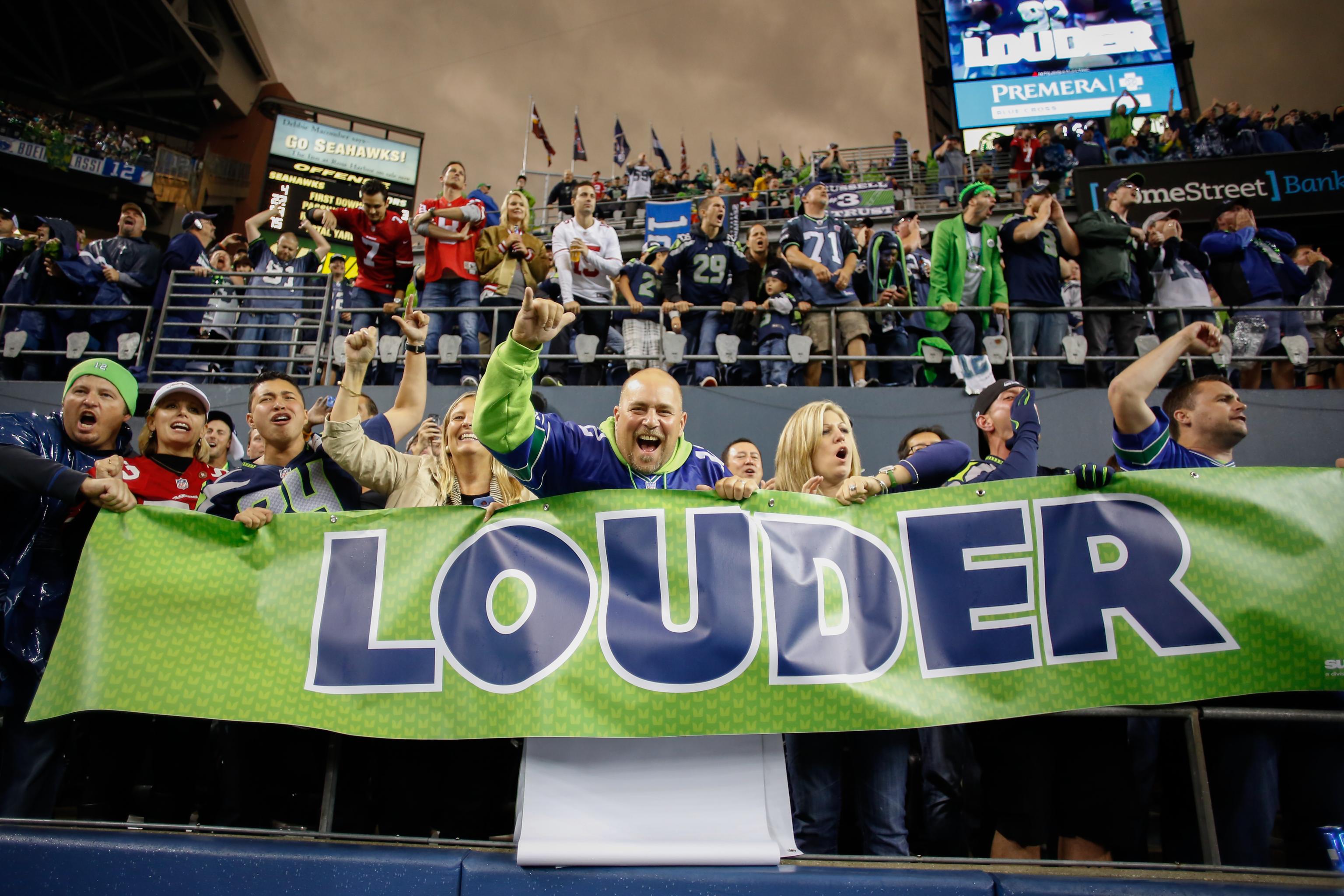 Seattle seahawks fans cheer during hi-res stock photography and