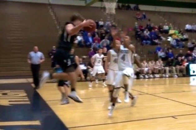 High School Basketball Player Makes Insane Bounce Shot From Behind