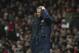 Arsenal's manager Arsene Wenger, looks on during their English Premier League match against Cardiff City, at Emirates Stadium, in London, Wednesday, Jan. 1, 2014. (AP Photo/Bogdan Maran)