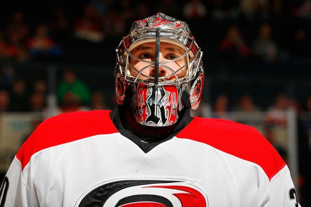 UNIONDALE, NY - OCTOBER 19: Cam Ward #30 of the Carolina Hurricanes skates against the New York Islanders at Nassau Veterans Memorial Coliseum on October 19, 2013 in Uniondale, New York. The Hurricanes defeated the Islanders 4-3. (Photo by Mike Stobe/NHLI via Getty Images)